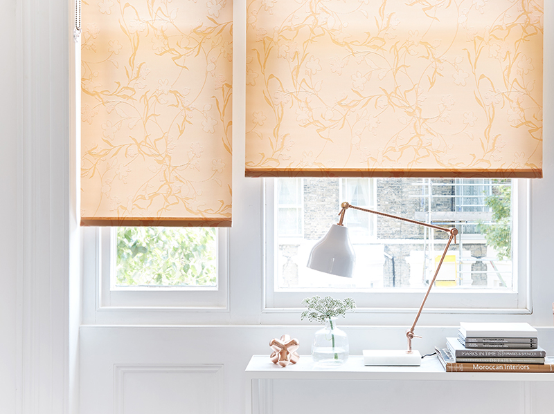 Peach roller blinds in a small contemporary home office