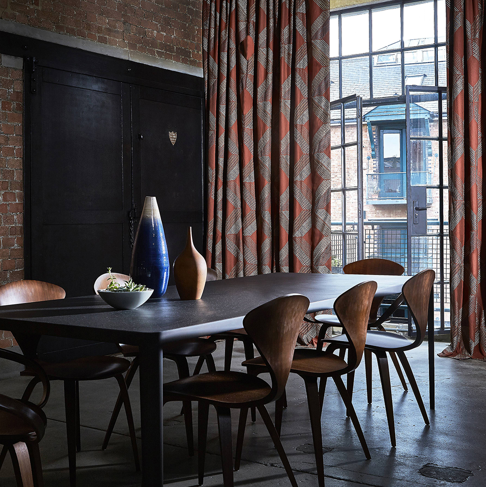 Dark industrial decor in converted loft.