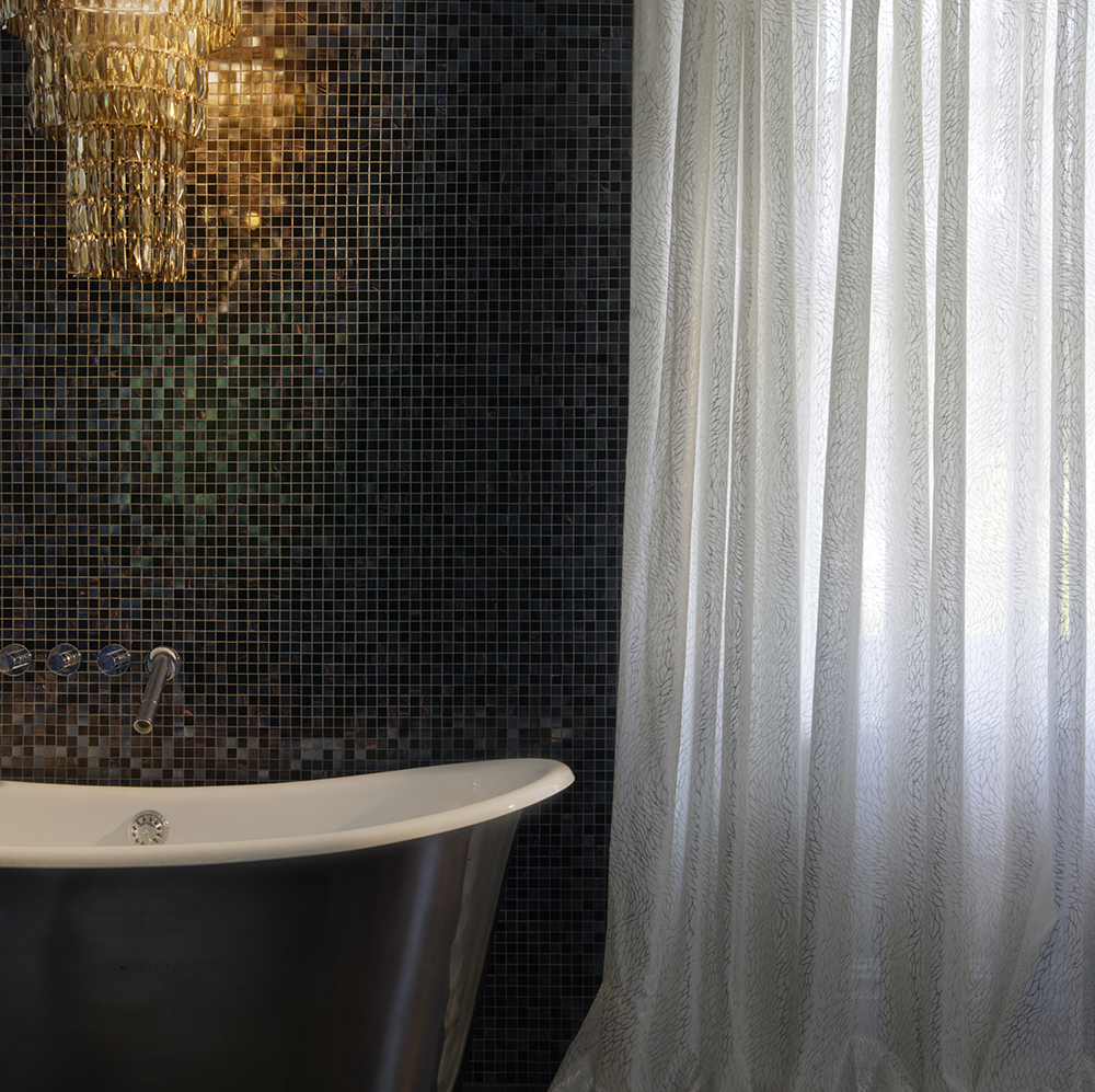 Glamorous black bathroom with white voile.