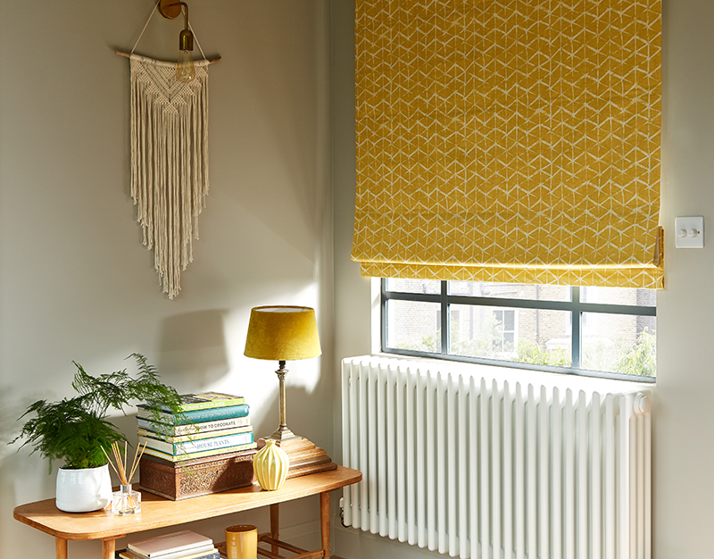 Mid-century modern interiors with mustard yellow Roman blind